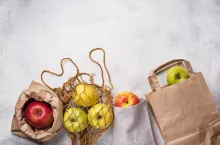 Apples in different eco-friendly packing. Top view