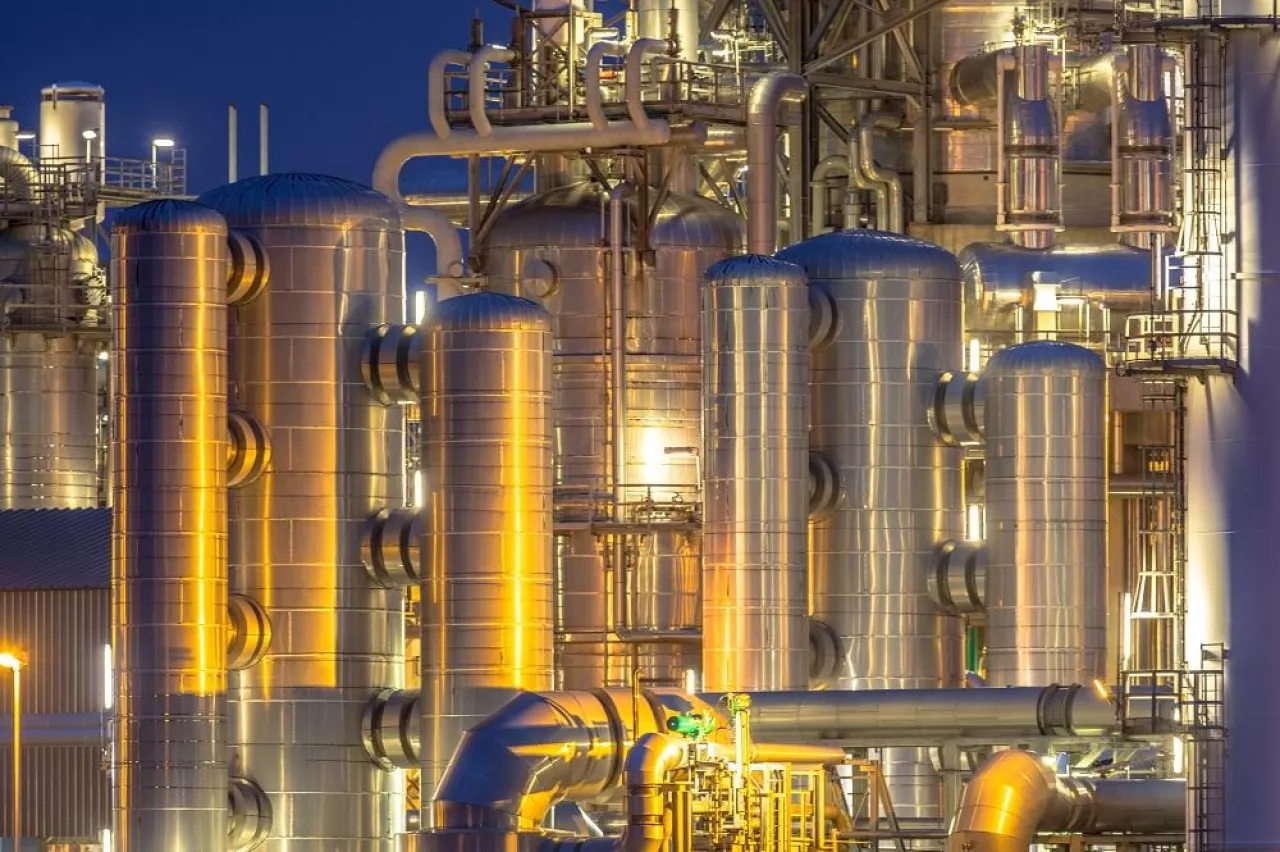 Chemical industry detail installation background at night. Petrochemical close up of factory.