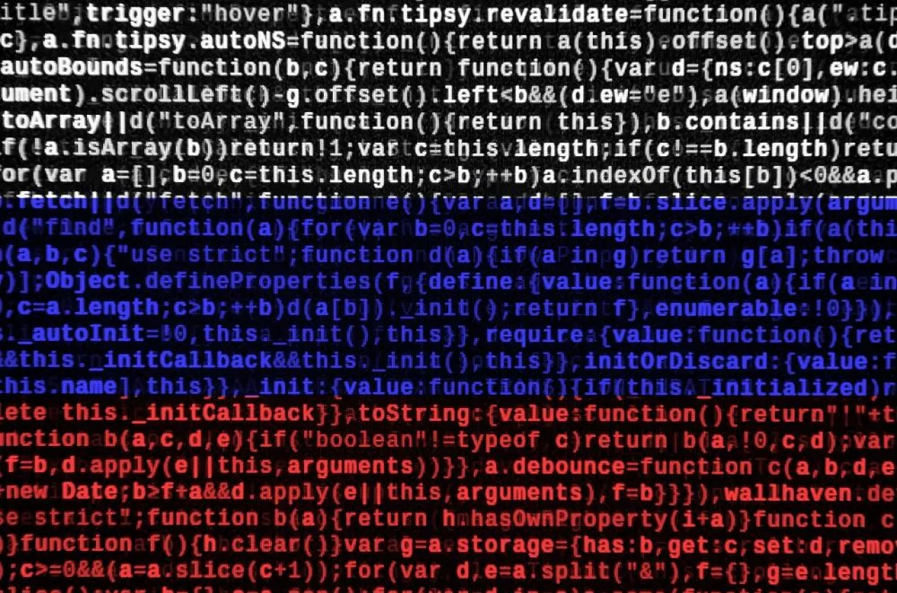 Russia flag is depicted on the screen with the program code. The concept of modern technology and site development.